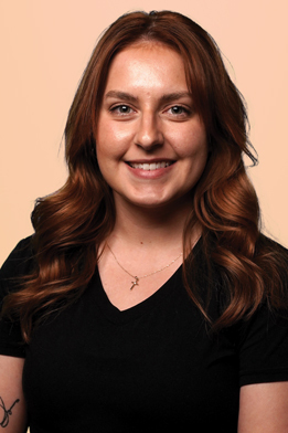 portrait photo of SYDNEY HEBERT Graphic Designer of burning stick creative